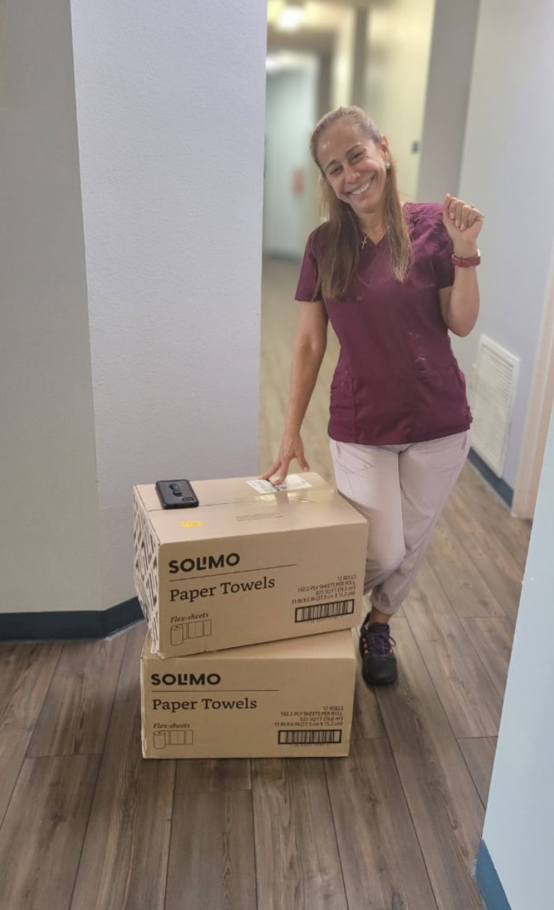 Two boxes of paper towels, donated by a grateful client. We are thankful for every contribution.